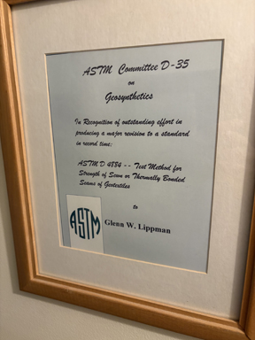 ASTM Committee D-35 award presented to Glenn W. Lippman for outstanding effort on the ASTM D4884 geotextile seam-strength standard revision